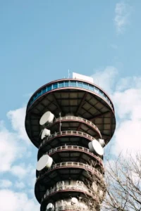 Tower with dish antennas against the sky