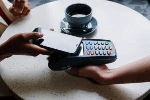 Phone tapped on a payment terminal to pay
