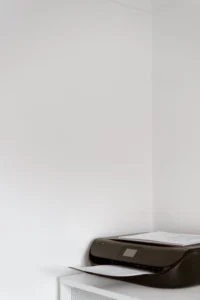 Printer with paper coming out